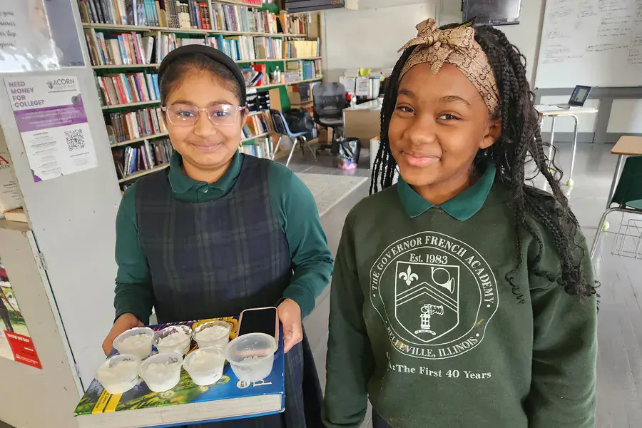 GFA students presenting a classroom science project