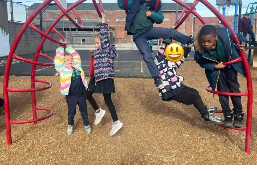 Students enjoying the Governor French Academy playground